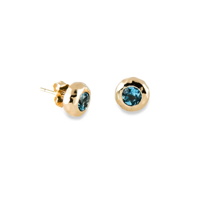 Hoop earrings with leather accents for a sleek and bold combination-Ripple Studs in Gold