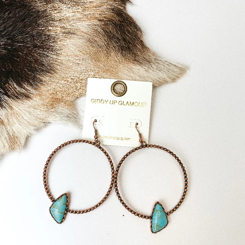 Hoop earrings with dangling charms for a playful and fun look-Copper Tone Textured Hoop Earrings with Turquoise Blue Stone