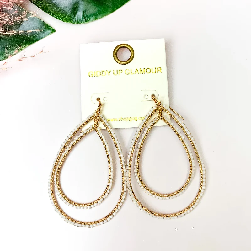 Best hoop earrings with snake-inspired designs for an edgy and fierce vibe-Double Open Teardrop Gold Tone Earrings with Beaded Outline in White