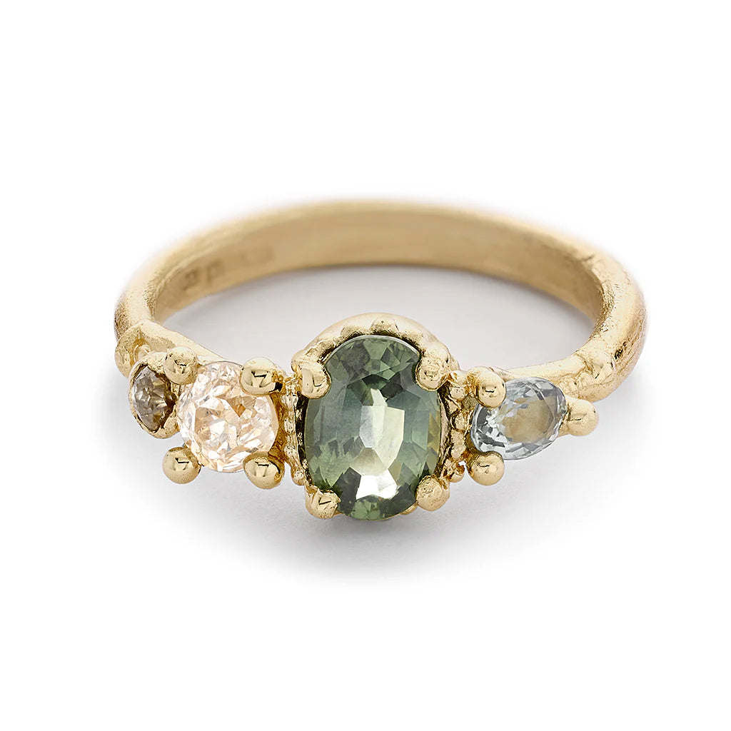 Engagement rings with rough opal for texture -Green Sapphire and Diamond Four Stone Ring