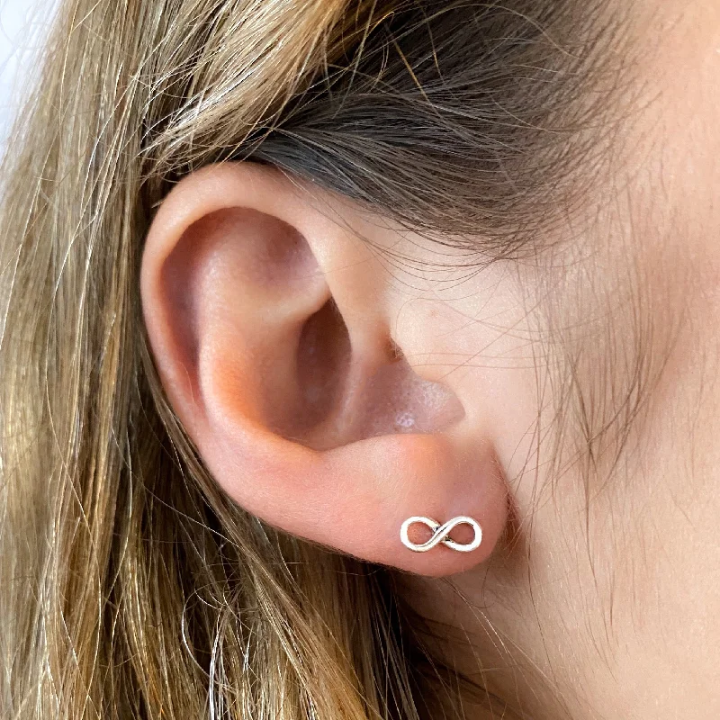 Hoop earrings with hearts for a sweet and romantic gesture-Infinity Loop Studs