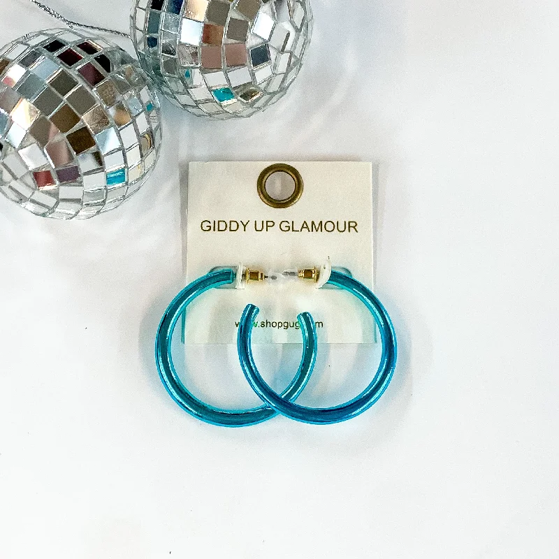 Best hoop earrings with geometric shapes for a modern and artistic appeal-Light Up Medium Neon Hoop Earrings In Blue