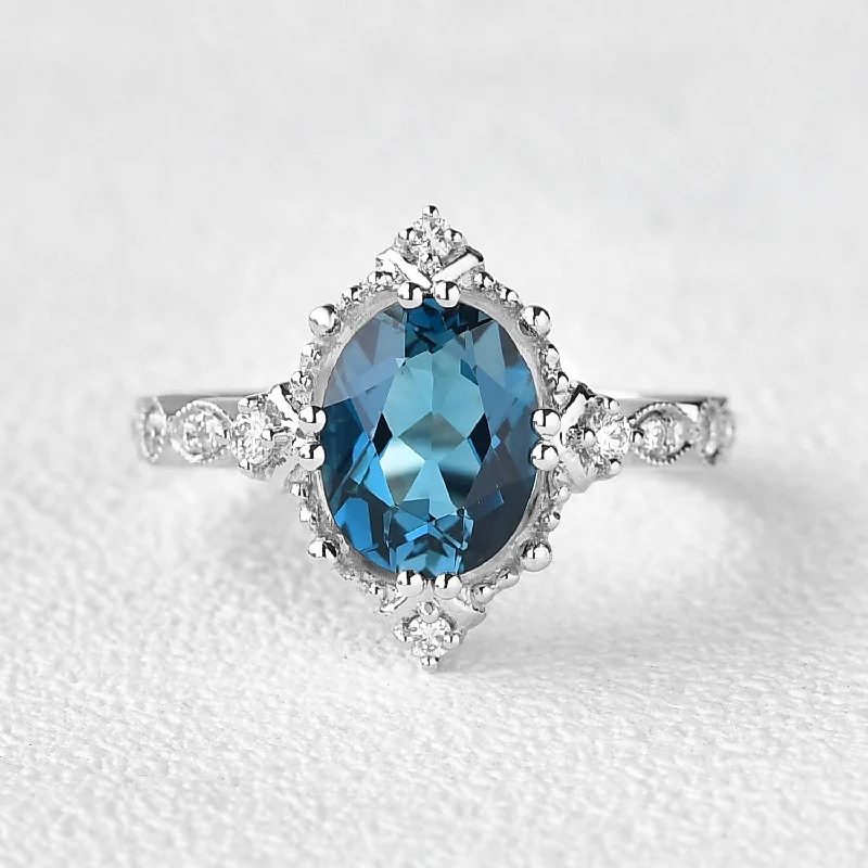 Engagement rings with vine-inspired topaz bands -London Blue Topaz & Moissanite Art Deco Ring