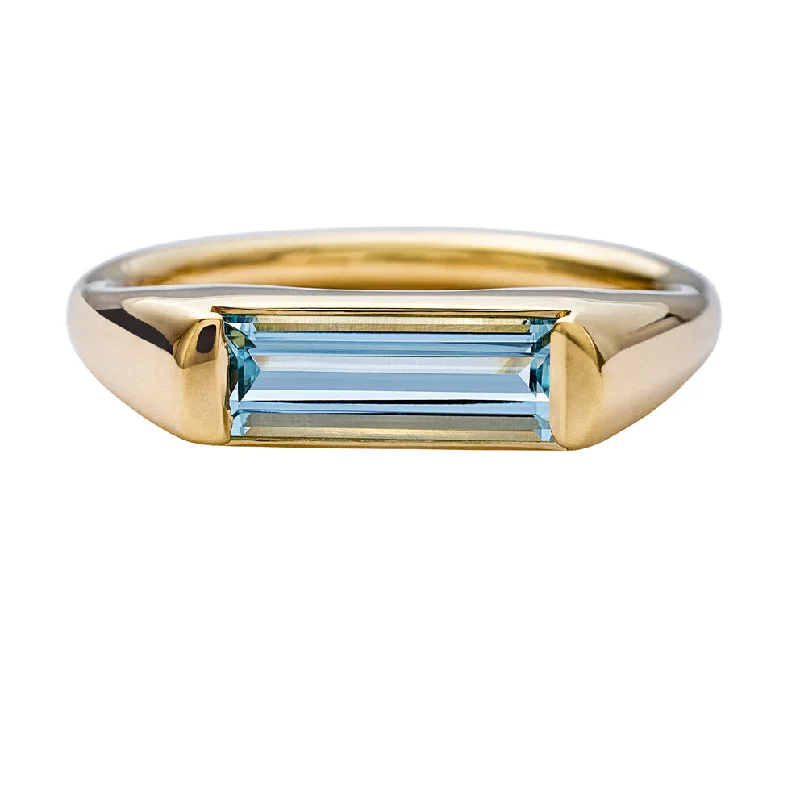 Engagement rings with hidden aquamarine stone accents -Modern Solitaire Ring with a Baguette Cut Aquamarine