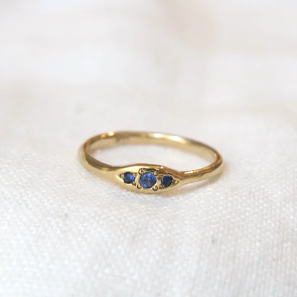 Engagement rings with hexagonal-cut sapphire gems -Trio Ring Yogo Sapphire