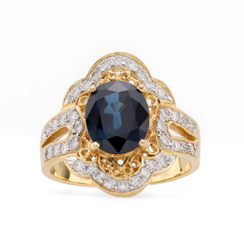 Engagement rings with pearl accents for elegance -Vintage 2.5 Carat Oval Cut Sapphire 18K Yellow Gold Cocktail Ring