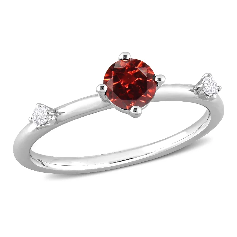 Rings with vintage claw prongs for elegance -3/4 CT TGW Garnet and White Topaz 3-Stone Ring in Sterling Silver