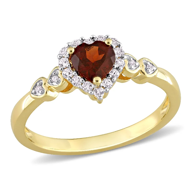 Rings with natural amber for warm glow -5/8 CT TGW Heart Shaped Garnet and Diamond Accent Halo Promise Ring in Yellow Plated Sterling Silver