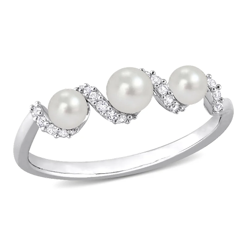 Rings with vine-wrapped bands for nature -Mimi & Max Women's Cultured Freshwater Pearl and 1/4ct TGW Created White Sapphire Swirl Ring in Sterling Silver