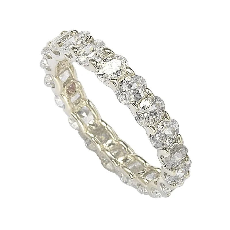 Titanium rings with rugged brushed metal look -Suzy Levian Sterling Silver Oval U-Shape Cubic Zirconia Eternity Band