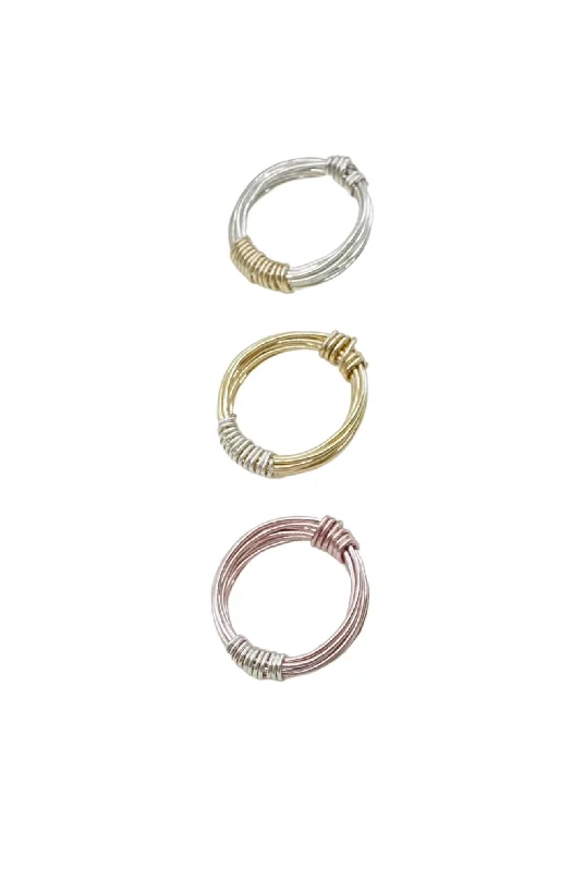 Dainty rings with subtle engraved star motifs -The Seadrift Wrap Ring