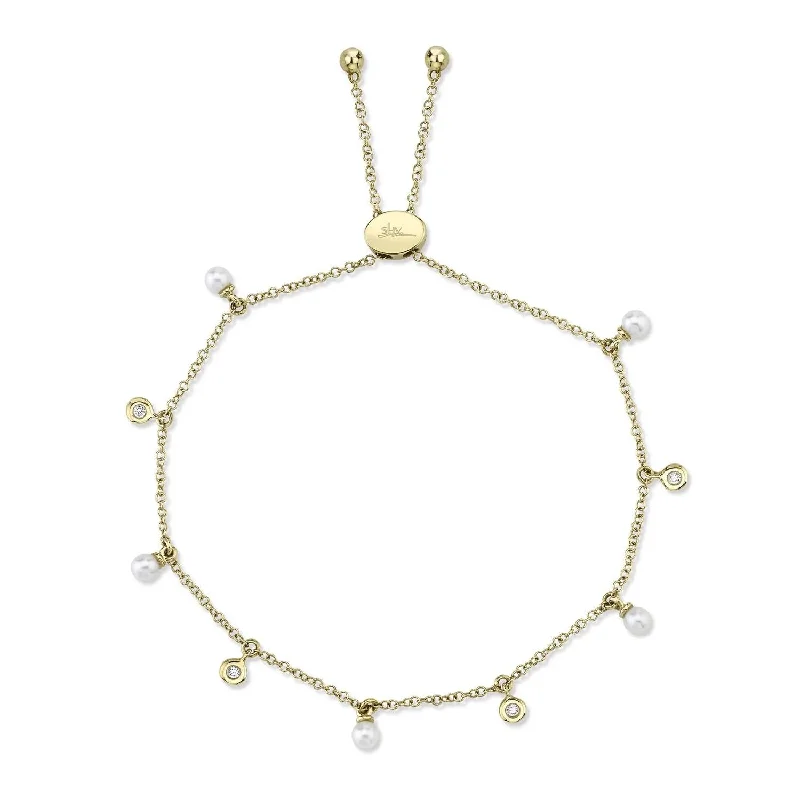 Best bangle bracelets with pastel-colored stones for a soft and delicate appearance-0.04ctw Diamond & Cultured Pearl Bolo Bracelet