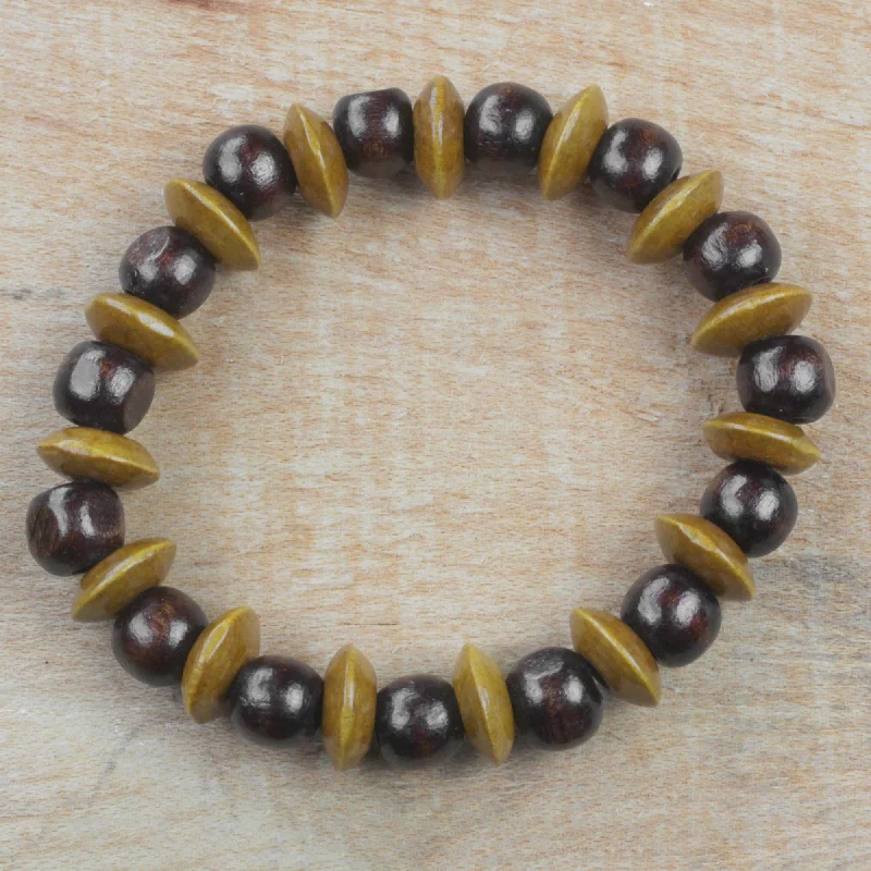 Simple bangle bracelets with smooth matte finishes for a subtle and modern style-Adukrom Beauty Dark Brown Wood Beaded Stretch Bracelet from Ghana