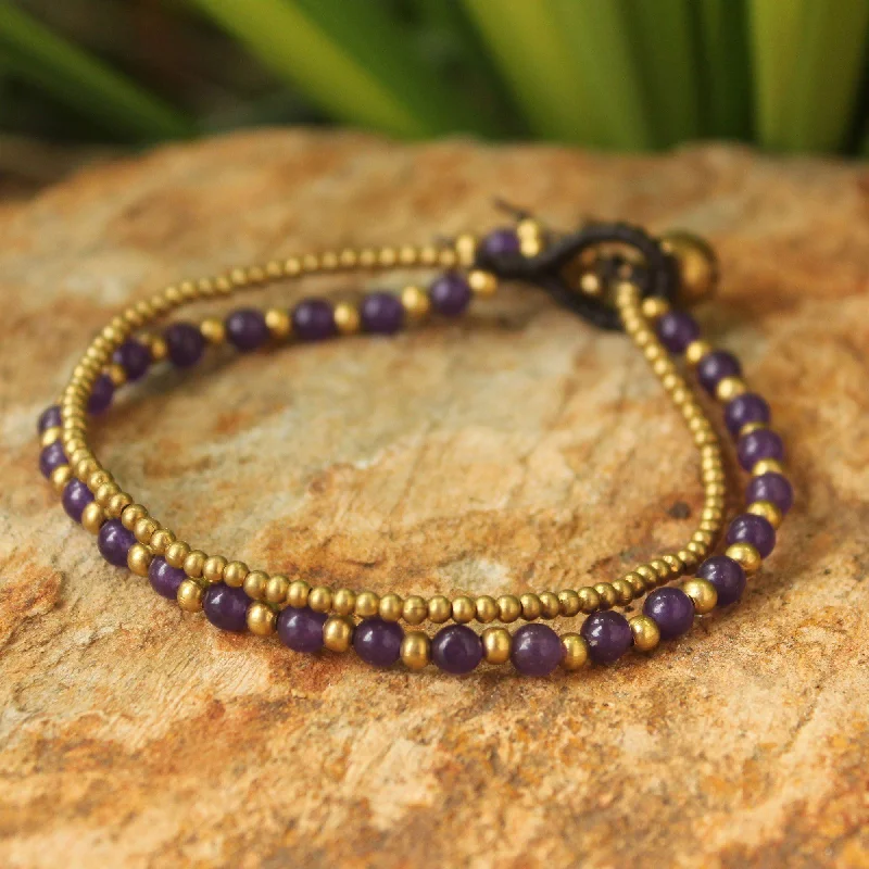 Bold bangle bracelets with textured finishes for a dynamic and modern style-Amethyst & Brass Beaded Bracelet