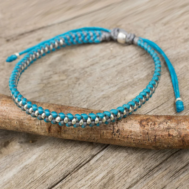 Best bangle bracelets with gemstone clusters for a bold and colorful statement piece-Blue Grey Progression Hand Knotted Macrame Bracelet with Hill Tribe Silver Beads