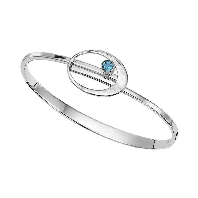 Best bangle bracelets with engraved floral patterns for a delicate and elegant design-Blue Topaz Sterling Silver Bangle Bracelet