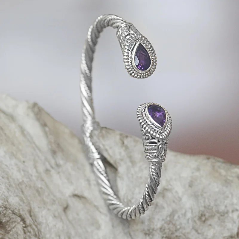 Best bangle bracelets with Swarovski crystals for a touch of sparkle and elegance-Bright Eyes Amethyst Sterling Silver Cuff Bracelet from Indonesia