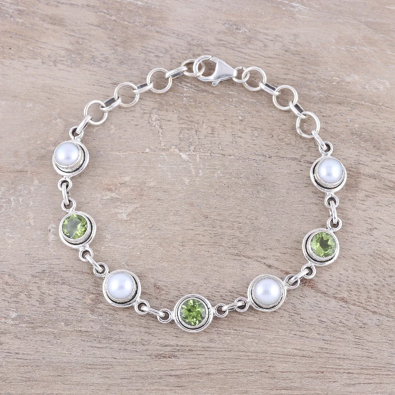 Best bangle bracelets with pastel-colored stones for a soft and delicate appearance-Elegant Glitter Peridot and Cultured Pearl Link Bracelet from India