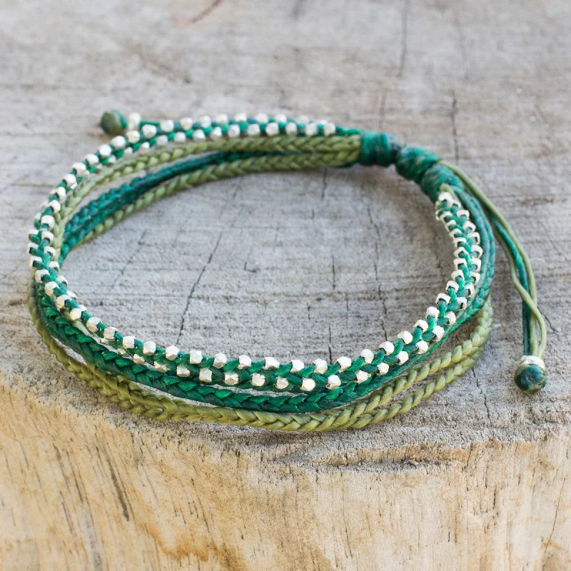 Best bangle bracelets with enamel floral patterns for a delicate and feminine touch-Fresh Green Hand Crafted Cord Wristband Bracelet with Silver Beads