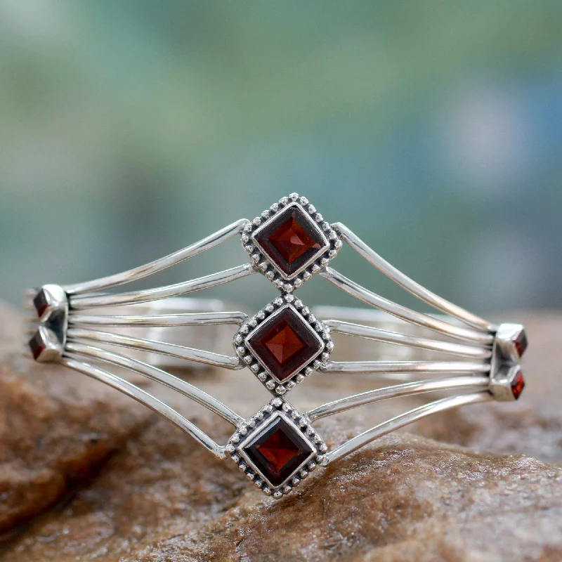 Chunky bangle bracelets with metallic finishes for a bold and statement-making look-Garnet & Sterling Silver Cuff Bracelet