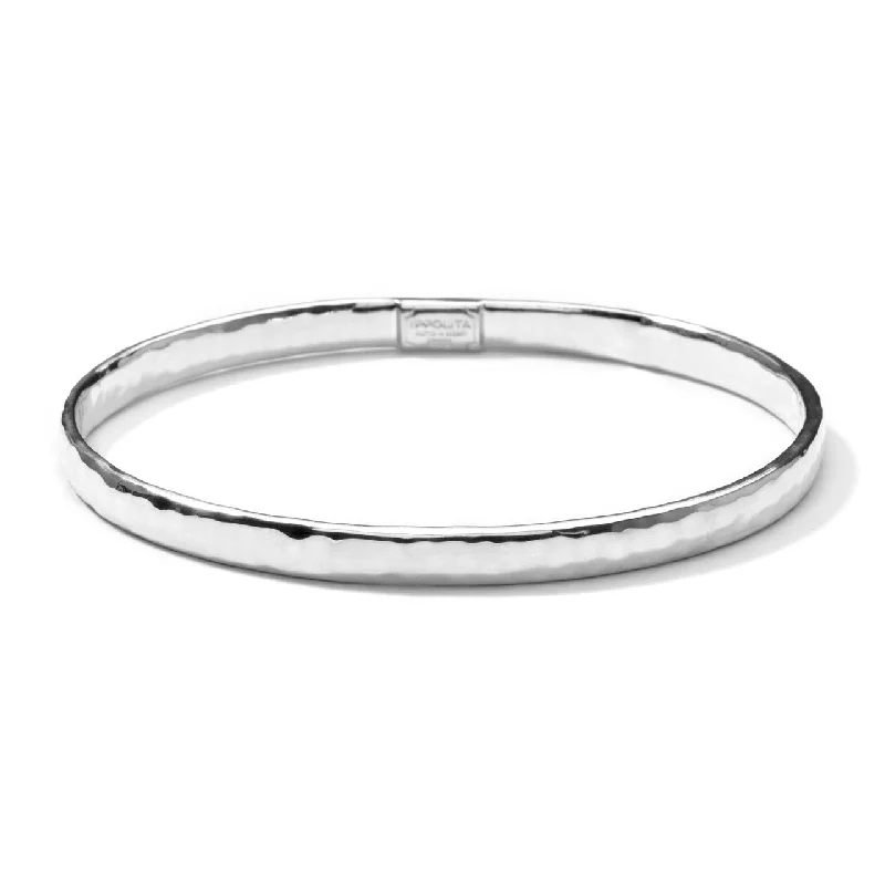 Oversized bangle bracelets with unique textures for a statement-making accessory-Hammered Bangle in Sterling Silver