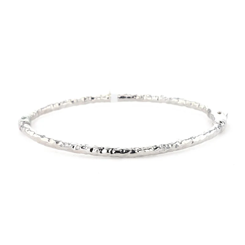 Elegant bangle bracelets with diamond-cut designs for added sparkle and elegance-Hammered Silver Bangle Bracelet