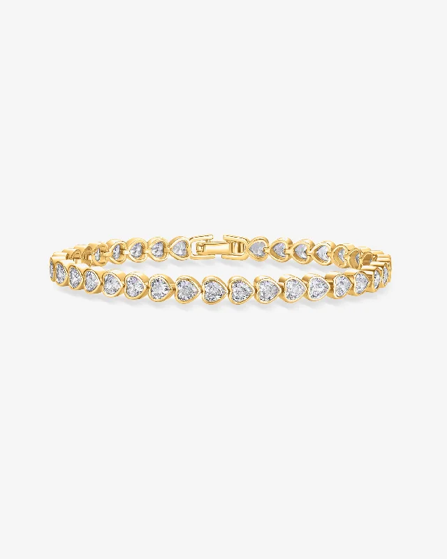 Simple gold bangle bracelets with smooth finishes for a classic and elegant style-Heart-Shaped Tennis Bracelet