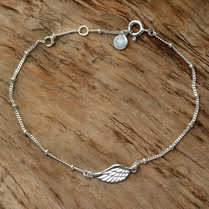 Sleek bangle bracelets with modern metallic finishes for a polished, chic design-One-Winged Angel Sterling Silver Bracelet