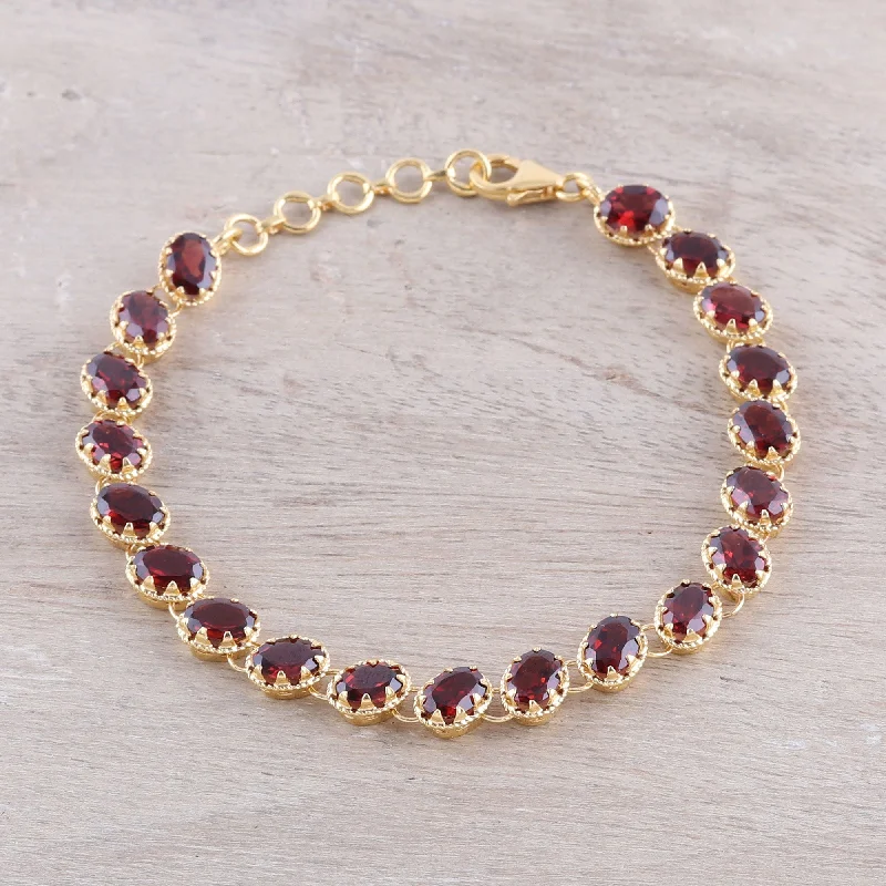 Wide bangle bracelets with bright gemstone accents for a bold, vibrant style-Regal Garland Gold Plated 20-Carat Garnet Tennis-Style Bracelet from India