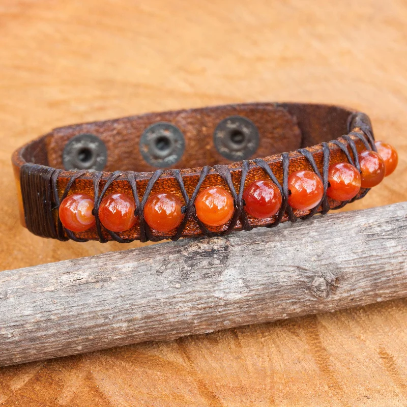 Wide metal bangle bracelets with engraved patterns for a luxurious and intricate look-Rock Walk in Orange Hand Crafted Carnelian and Leather Band Bracelet