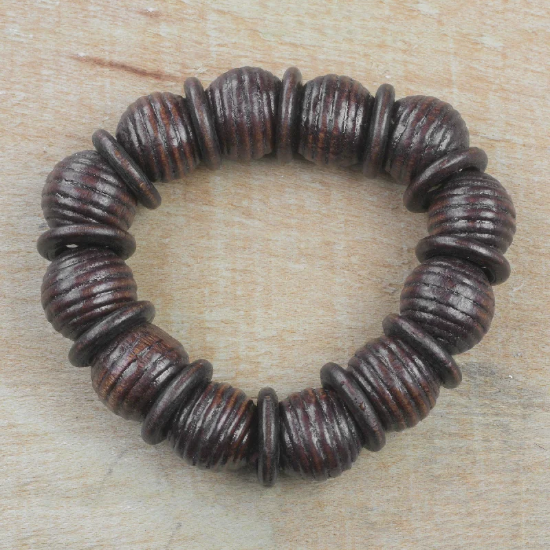 Elegant bangle bracelets with diamond-cut designs for added sparkle and elegance-Royal Rings in Dark Brown Dark Brown Sese Wood Beaded Stretch Bracelet from Ghana