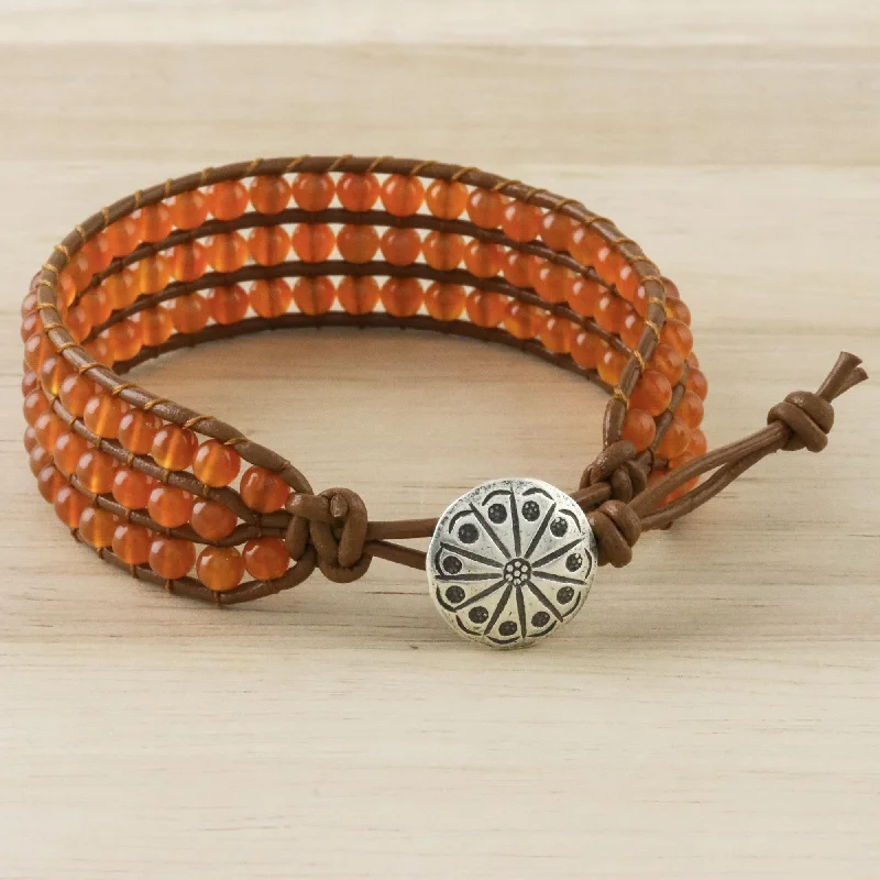 Wide bangle bracelets with boho-inspired patterns for a free-spirited design-Sunlit Dawn Carnelian Bead and Karen Silver Button Wristband Bracelet