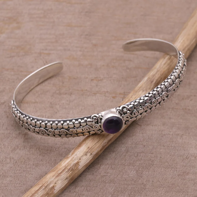 Wide bangle bracelets with bohemian designs for a bold and carefree style-Swirling Altar Amethyst and Sterling Silver Cuff Bracelet from Bali