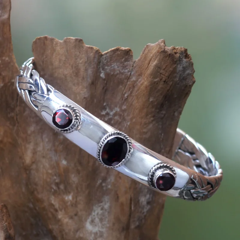 Lightweight bangle bracelets with subtle shimmer for an understated yet elegant look-Three Guardians Braided Sterling Silver Cuff Bracelet with Three Garnets