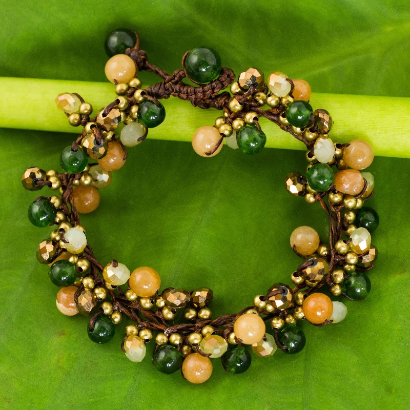 Thin bangle bracelets with mixed metals for a contemporary and versatile look-Tropical Cattlelaya Artisan Hand Knotted Green Yellow Beaded Bracelet